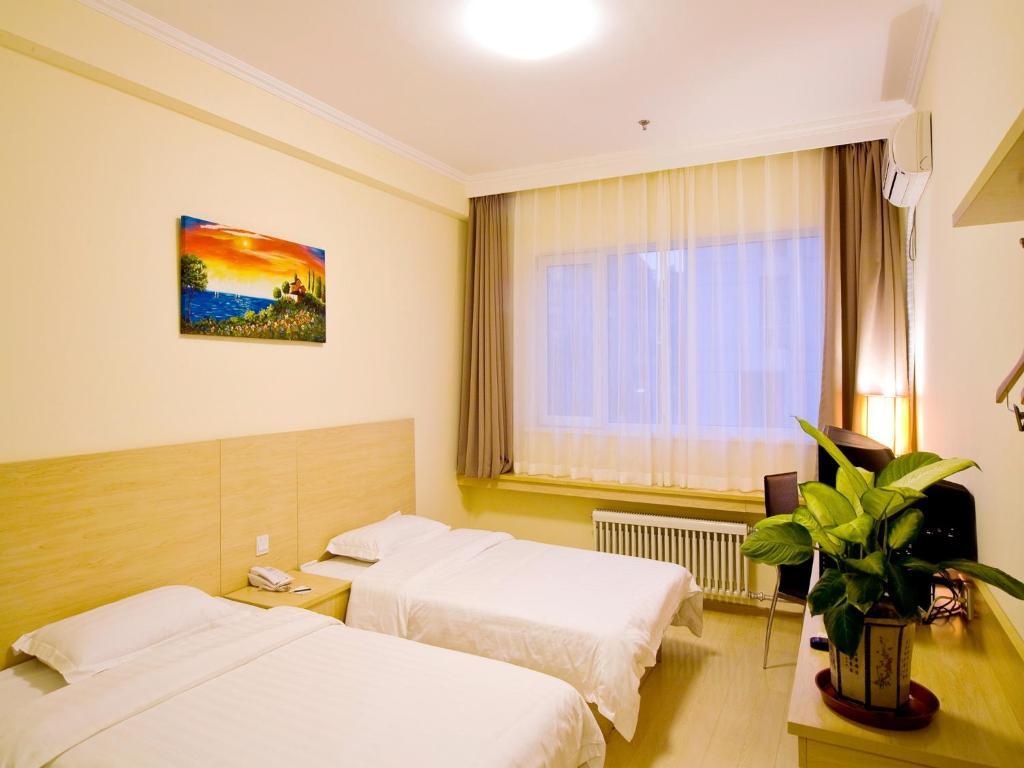 Haitian E Inn Qingdao Oda fotoğraf